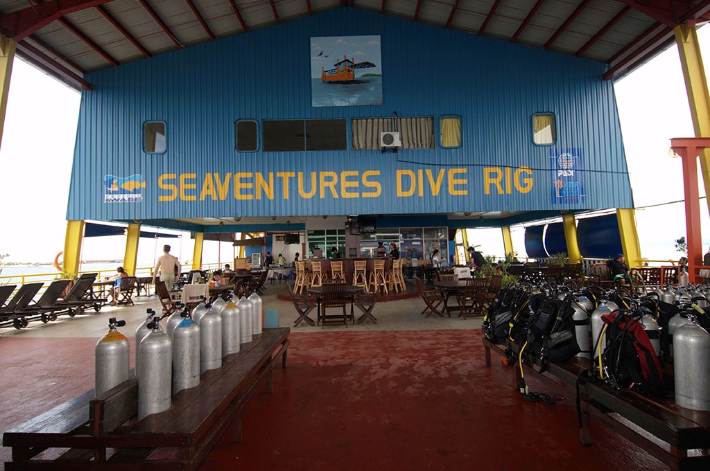 A view of the SeaVentures main deck, with lining and lounge areas in the background.