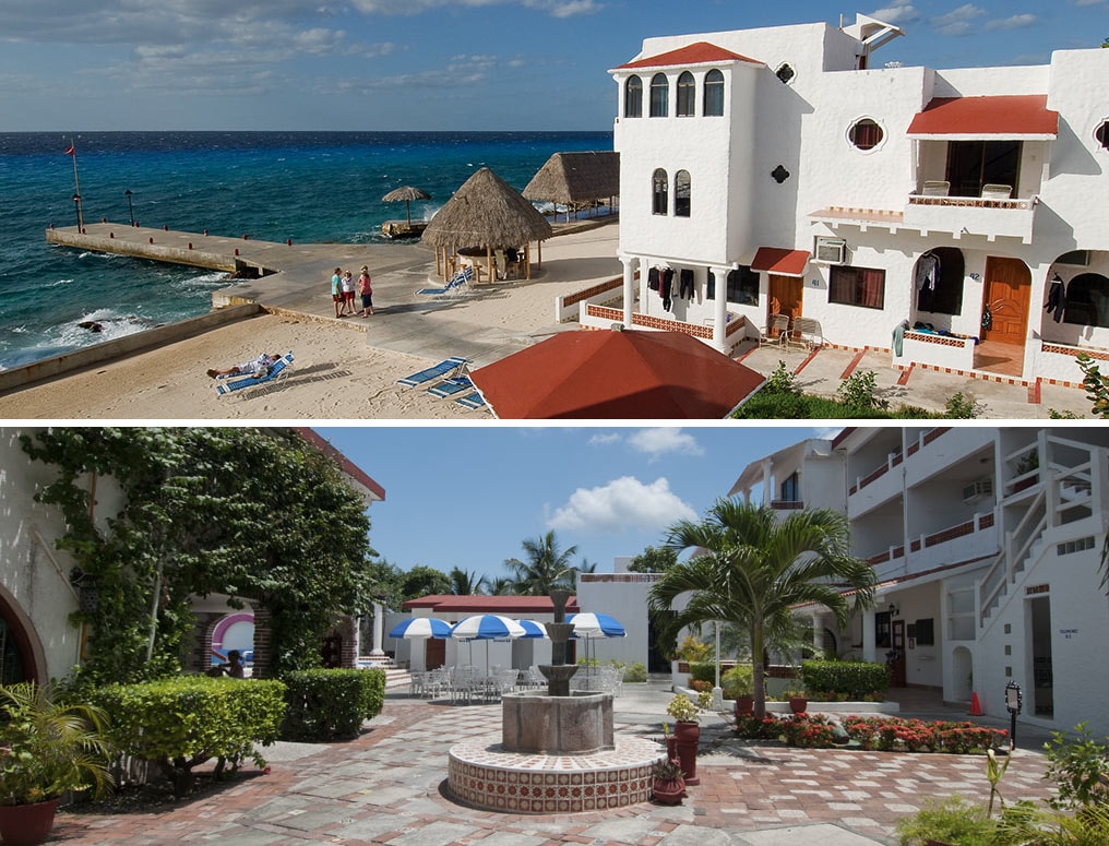 The waterfront grounds of the Scuba Club feature a classic Spanish-Colonial style, with white stucco walls and red tile roofs.