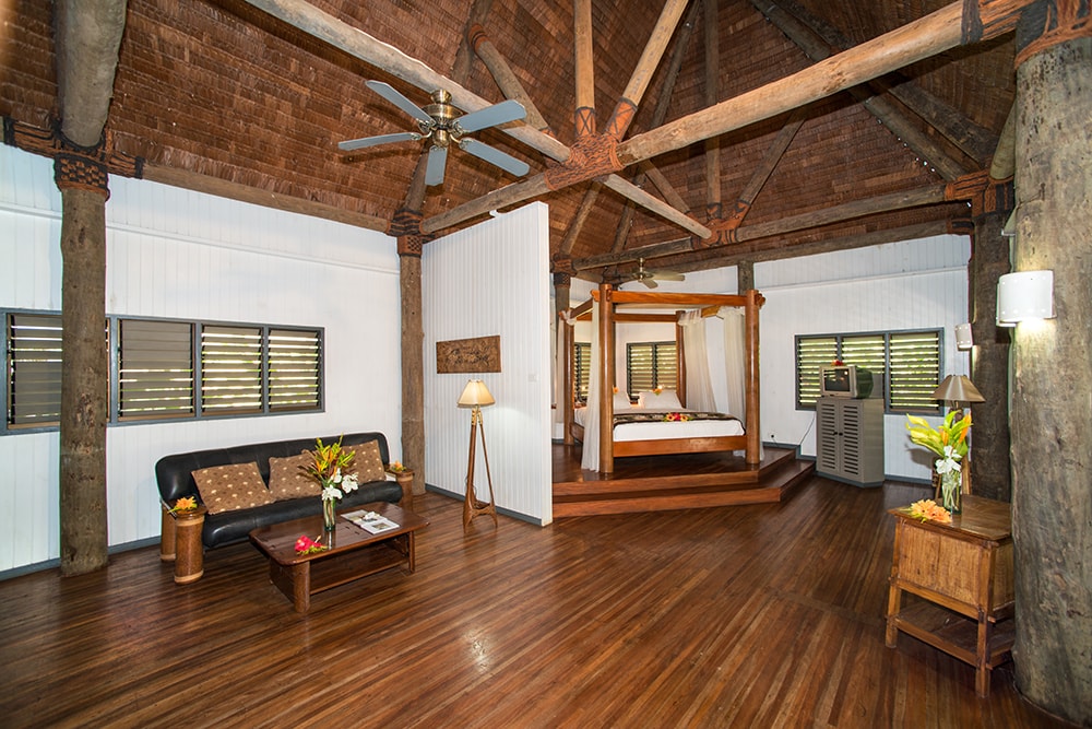 Vaulted ceilings and rich woodwork add a sense of spacious comfort to the resort bures.