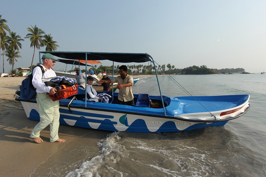Small launches are used to approach the whales of Sri Lanka.