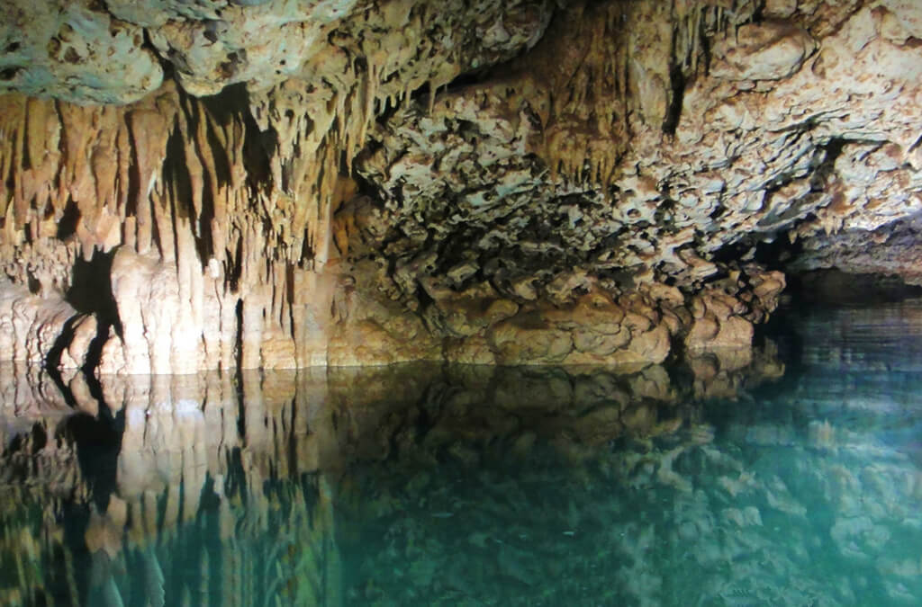A semi-flooded cave on the island's west coast provides a unique opportunity to snorkel underground. A semi-flooded cave on the island's west coast provides a unique opportunity to snorkel underground.
