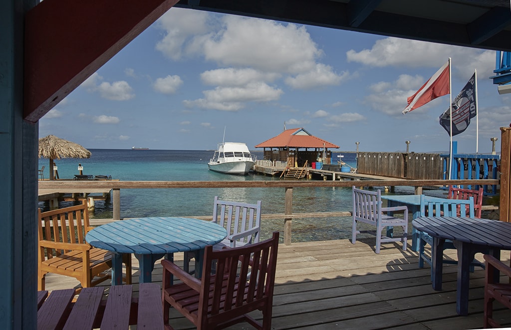 Just steps away from boats and the shop, divers can relax in a casual setting with waterfront views before or between dives.