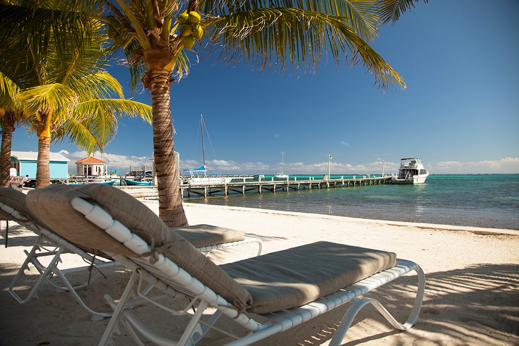 On Belize's Ambergris Caye, beachfront dive resorts are just a short boat ride away from the barrier reef.