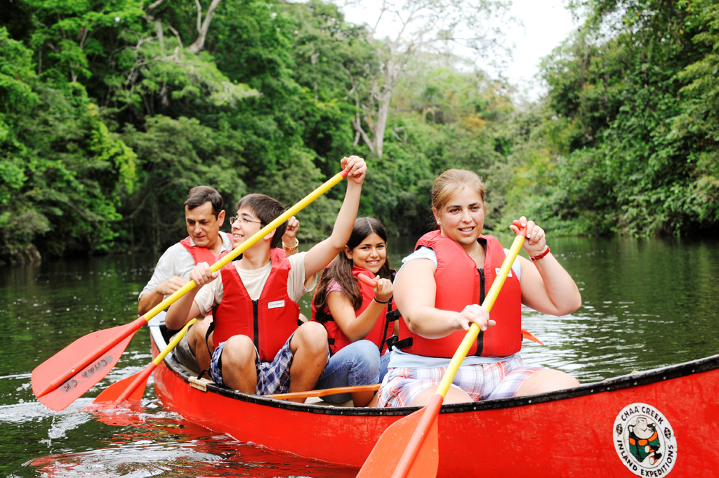 Paddlers set out from The Lodge at Chaa Creek to explore Belize's Macal River.