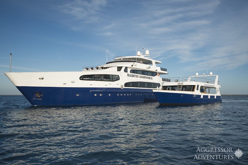 The Maldives Aggressor II alongside its custom-built dhoni dive tender.