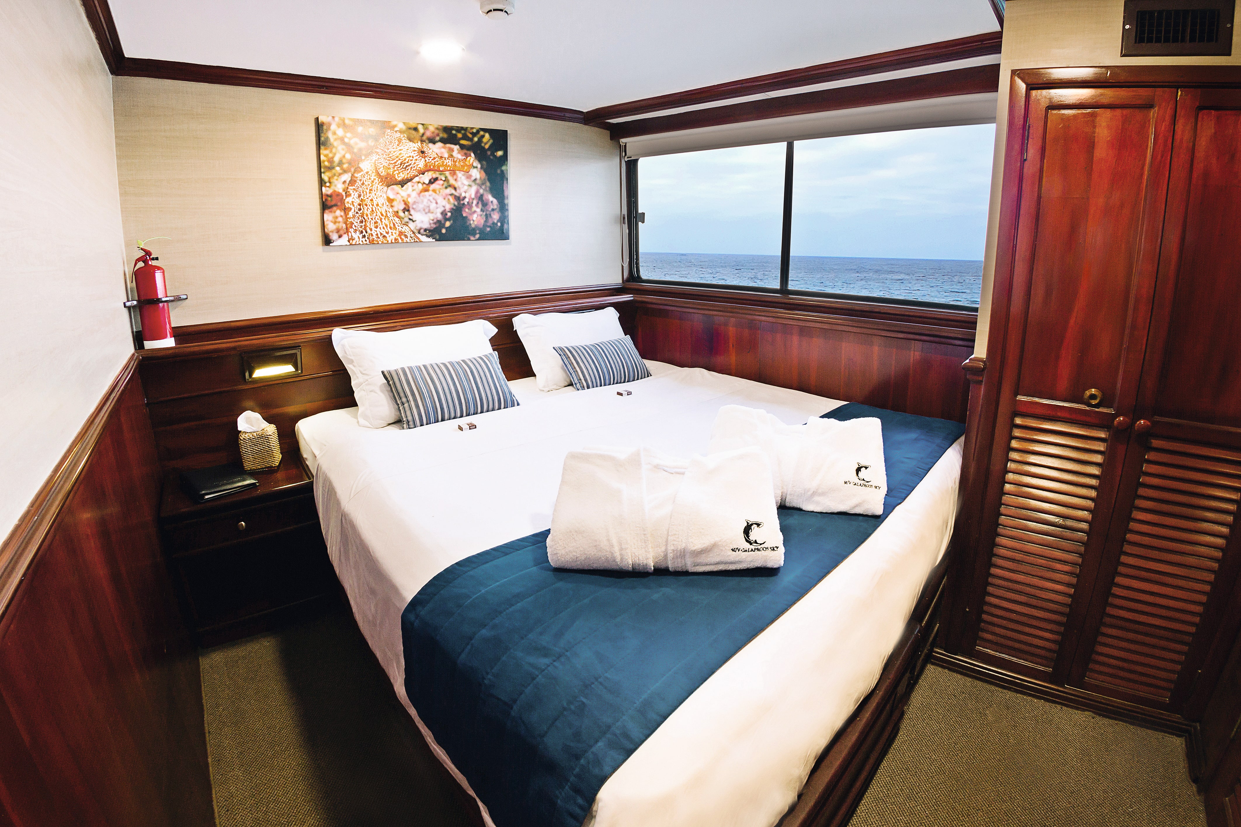 Master staterooms feature large picture windows and the option of two twins or a single king-size bed. Master staterooms feature large picture windows and the option of two twins or a single king-size bed.