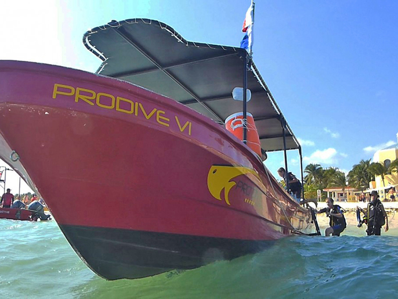 Fast outboard-powered launches pick up at beachfront hotels in Playa Del Carmen.