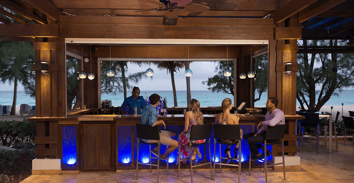 The open-air beach bar at Divi Southwinds faces the turquoise waters of Dover Beach.