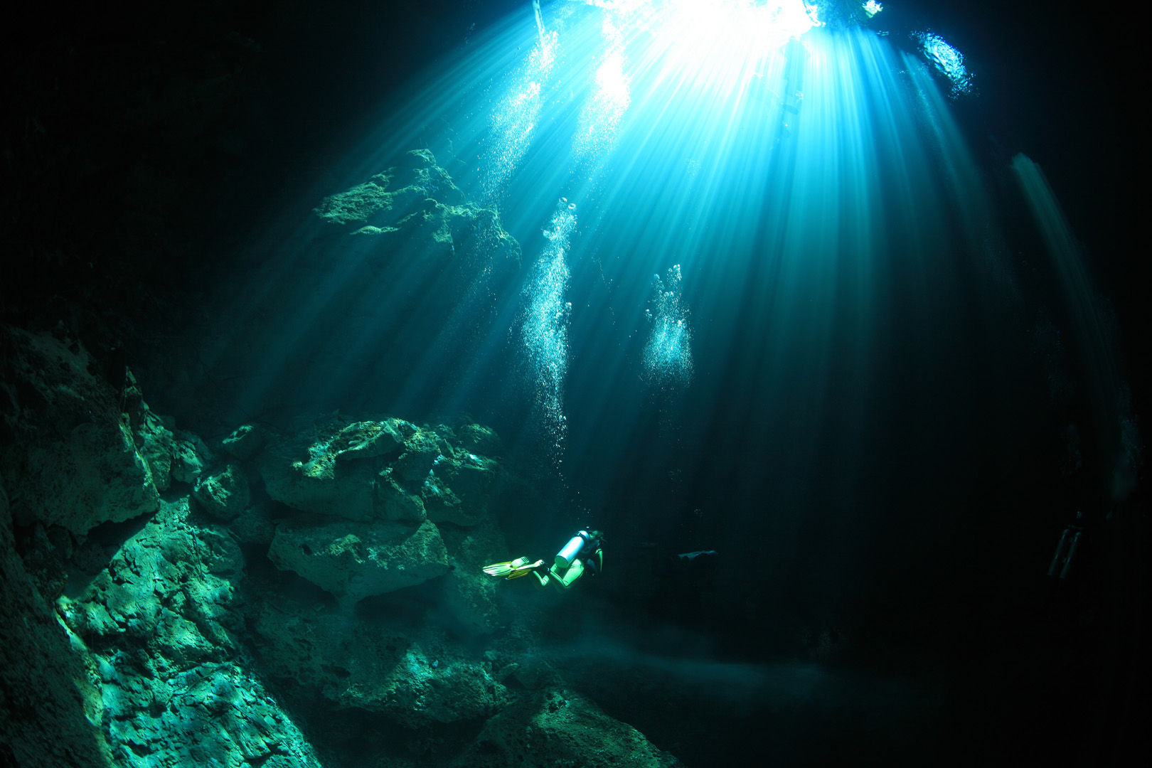 Very different adventures await those who explore one of the many clear fresh water cenotes with their caverns and caves that riddle Mexico's Yucatan Peninsula