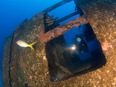 Diver exploring the Hilma Hooker wreck in Bonaire